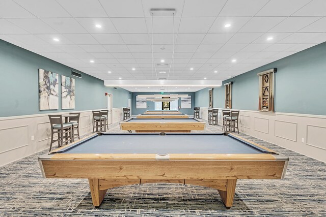 7076 Huntington Ln Unit 206, Delray Beach, FL 33446 - rec room with a decorative wall, billiards table, wainscoting, recessed lighting, and carpet