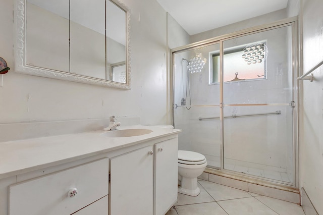 5800 Fernley Dr W Unit 51, Greenacres, FL 33415 - full bathroom featuring vanity, toilet, a stall shower, and tile patterned flooring