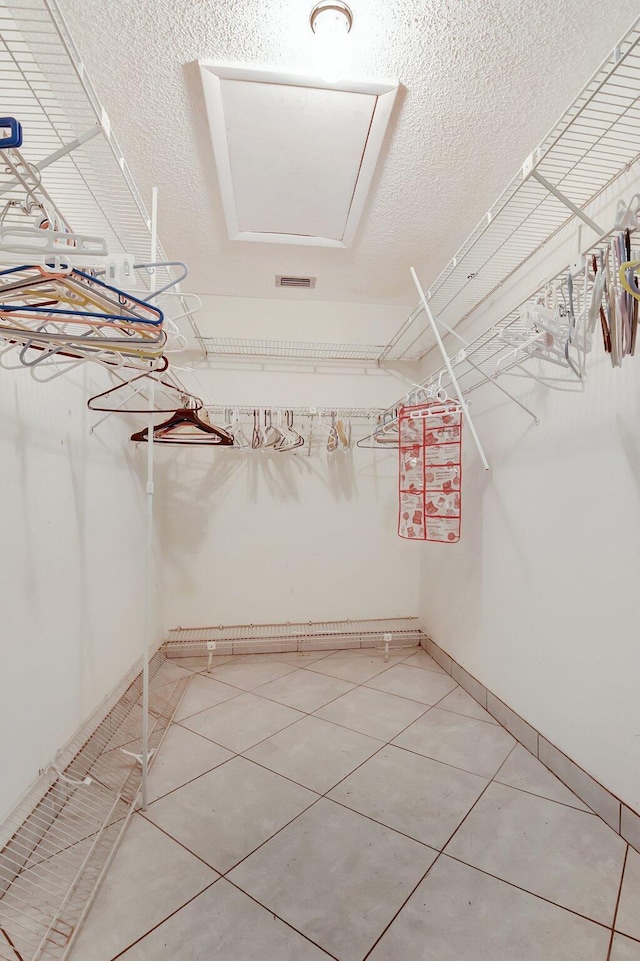 5800 Fernley Dr W Unit 51, Greenacres, FL 33415 - walk in closet featuring light tile patterned floors