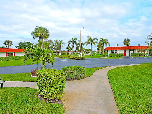 5800 Fernley Dr W Unit 51, Greenacres, FL 33415 - view of community featuring a yard