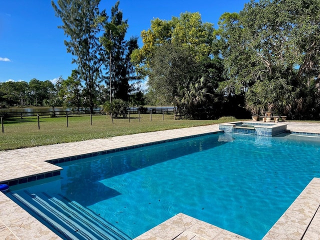 5775 Reynolds Rd, Lake Worth, FL 33449 - view of swimming pool with a pool with connected hot tub and view of scattered trees
