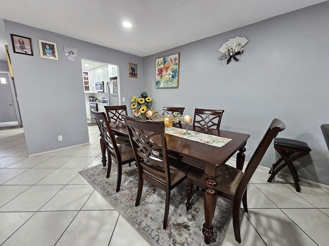 5730 Fernley Dr E Unit 4, West Palm Beach, FL 33415 - dining room with light tile patterned floors and recessed lighting