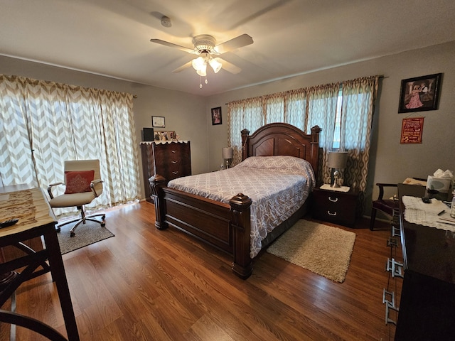 5730 Fernley Dr E Unit 4, West Palm Beach, FL 33415 - bedroom with dark wood finished floors and a ceiling fan