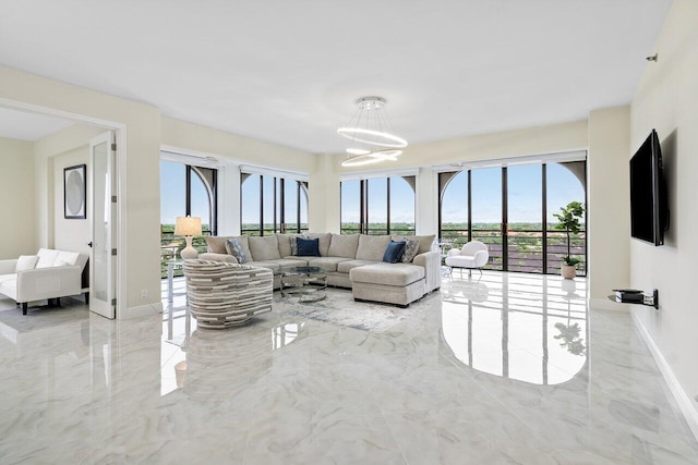 7578 Regency Lake Dr Unit 802, Boca Raton, FL 33433 - living room with marble tiled flooring and a chandelier