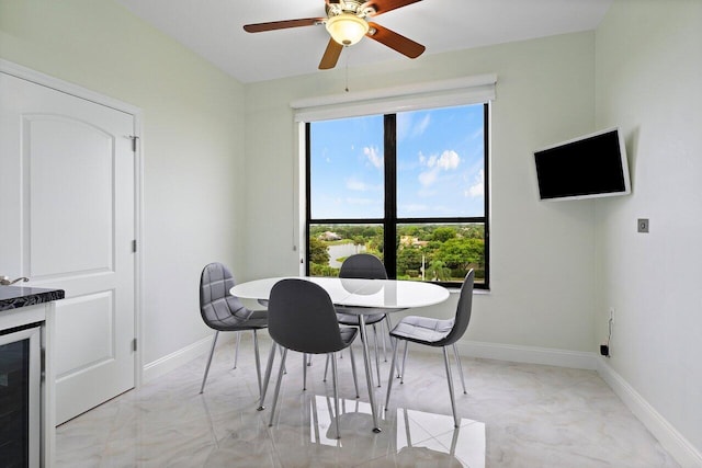 7578 Regency Lake Dr Unit 802, Boca Raton, FL 33433 - dining room with healthy amount of natural light, ceiling fan, and beverage cooler