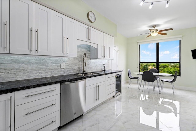 7578 Regency Lake Dr Unit 802, Boca Raton, FL 33433 - kitchen with stainless steel dishwasher, light marble finish floors, decorative backsplash, beverage cooler, and dark stone counters