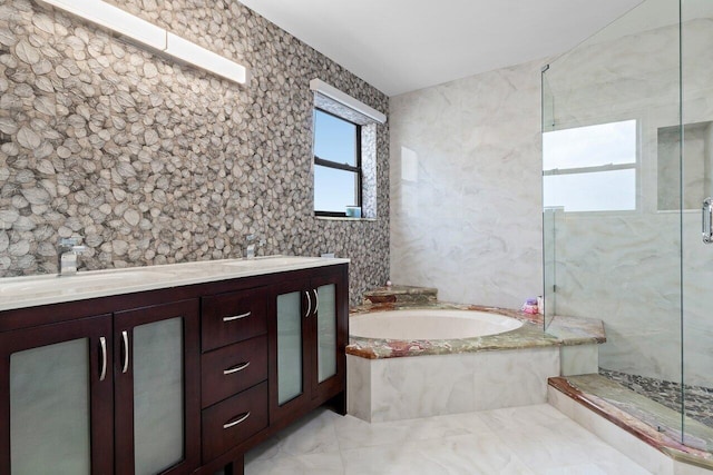 7578 Regency Lake Dr Unit 802, Boca Raton, FL 33433 - bathroom with a bath, a stall shower, marble finish flooring, and double vanity