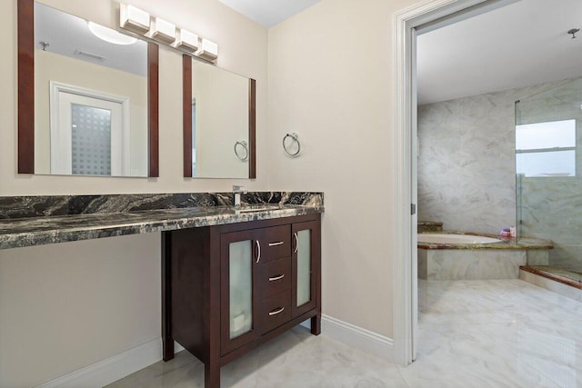 7578 Regency Lake Dr Unit 802, Boca Raton, FL 33433 - bathroom featuring vanity, marble look tiles, and a garden tub