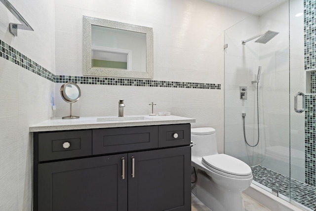 7578 Regency Lake Dr Unit 802, Boca Raton, FL 33433 - bathroom with tile walls, a stall shower, and vanity