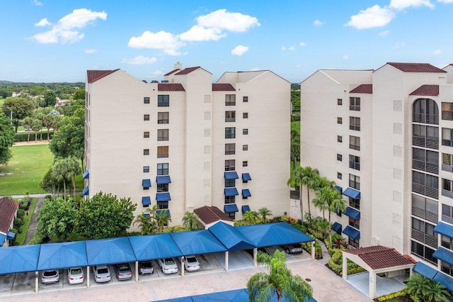 7578 Regency Lake Dr Unit 802, Boca Raton, FL 33433 - view of apartment building / complex with parking