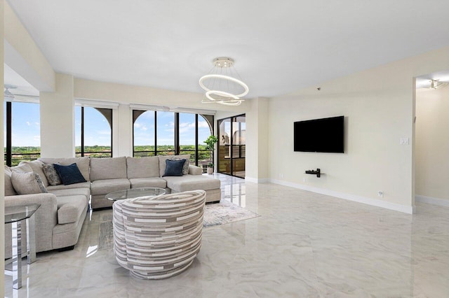 7578 Regency Lake Dr Unit 802, Boca Raton, FL 33433 - living area with light marble finish floors and a chandelier