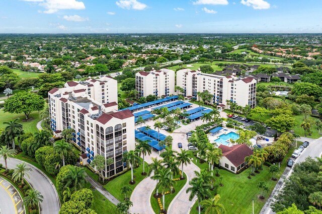 7578 Regency Lake Dr Unit 802, Boca Raton, FL 33433 - drone / aerial view of apartment complex / building and a pool