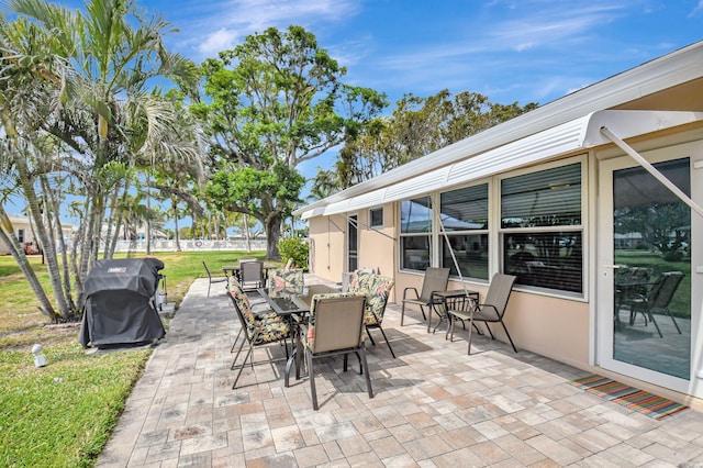 200 N High Point Blvd Unit C, Boynton Beach, FL 33435 - view of patio / terrace featuring area for grilling and outdoor dining area
