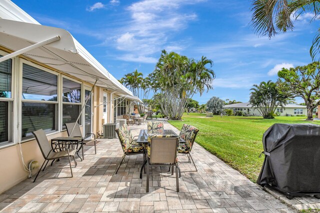200 N High Point Blvd Unit C, Boynton Beach, FL 33435 - view of patio with outdoor dining area, central air condition unit, and area for grilling