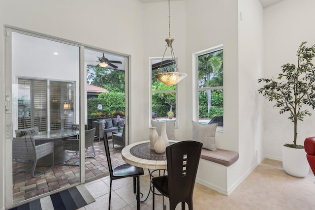 139 Sedona Way, Palm Beach Gardens, FL 33418 - dining room with a high ceiling, light tile patterned floors, ceiling fan, and baseboards