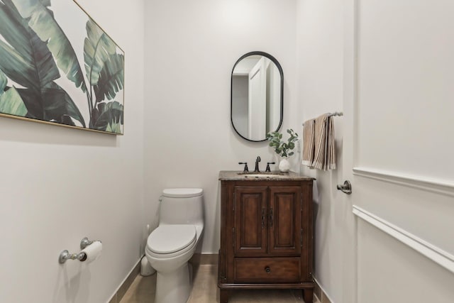 139 Sedona Way, Palm Beach Gardens, FL 33418 - bathroom featuring toilet, vanity, and baseboards