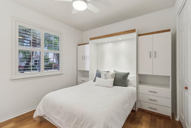 139 Sedona Way, Palm Beach Gardens, FL 33418 - bedroom with dark wood finished floors, baseboards, and ceiling fan