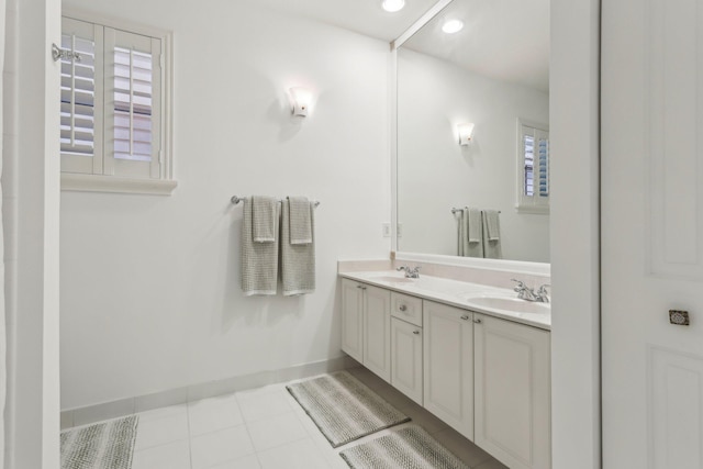 139 Sedona Way, Palm Beach Gardens, FL 33418 - bathroom with double vanity, baseboards, and recessed lighting