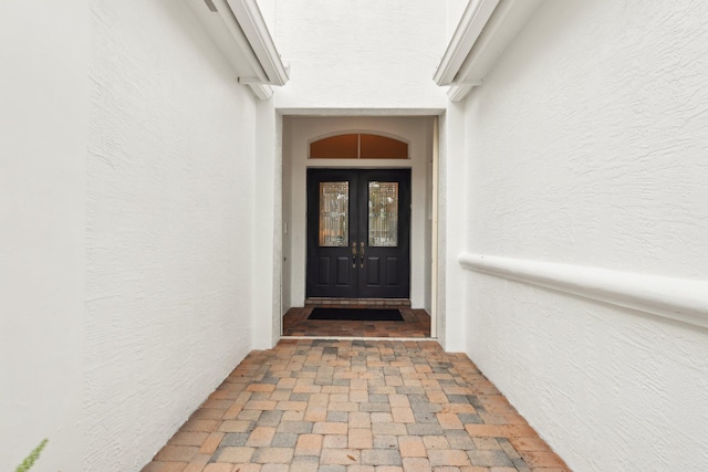 139 Sedona Way, Palm Beach Gardens, FL 33418 - property entrance featuring stucco siding and french doors