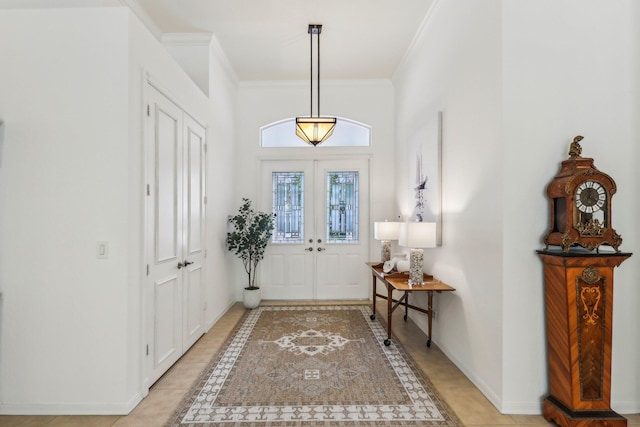 139 Sedona Way, Palm Beach Gardens, FL 33418 - foyer entrance featuring baseboards, ornamental molding, and light tile patterned flooring