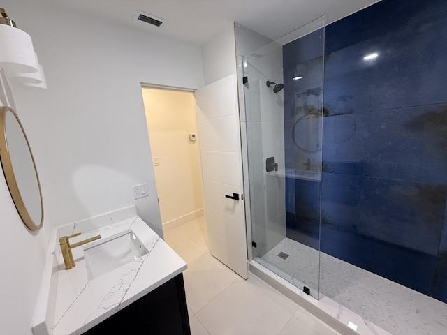 345 Pinehurst Rd, Palm Springs, FL 33461 - full bath with walk in shower, vanity, and tile patterned floors