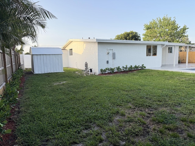 345 Pinehurst Rd, Palm Springs, FL 33461 - rear view of house featuring a patio and stucco siding