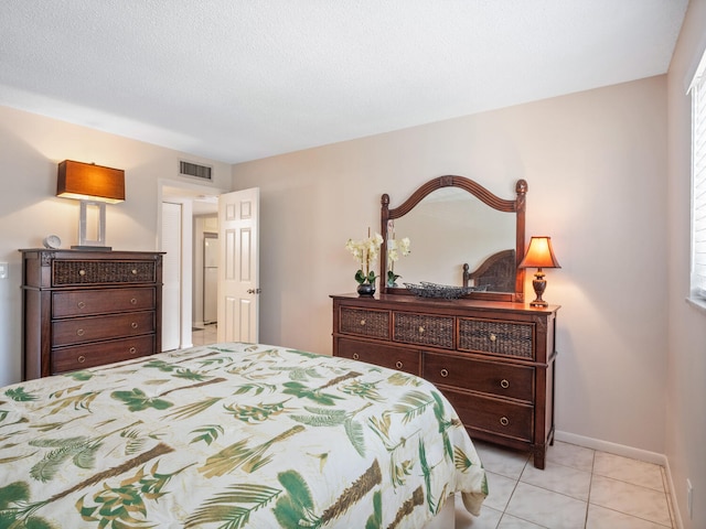 715 Lori Dr Unit 213, Palm Springs, FL 33461 - bedroom featuring baseboards and light tile patterned floors