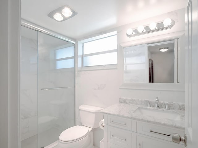 715 Lori Dr Unit 213, Palm Springs, FL 33461 - bathroom with vanity, toilet, and a stall shower