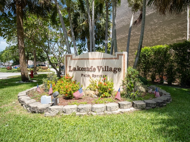 715 Lori Dr Unit 213, Palm Springs, FL 33461 - community sign featuring a lawn