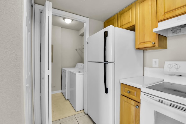 15185 Michelangelo Blvd Unit 204, Delray Beach, FL 33446 - laundry room featuring independent washer and dryer and light tile patterned floors