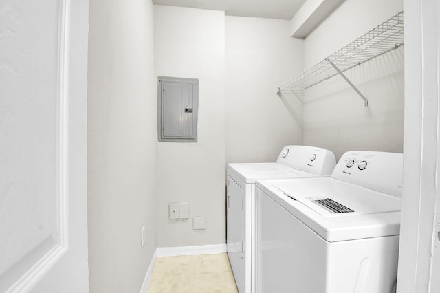 15185 Michelangelo Blvd Unit 204, Delray Beach, FL 33446 - laundry room with electric panel, washer and dryer, and baseboards