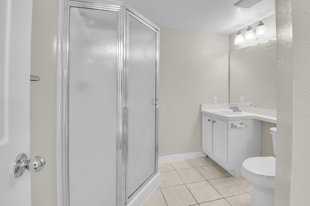 15185 Michelangelo Blvd Unit 204, Delray Beach, FL 33446 - bathroom featuring a stall shower, vanity, toilet, and tile patterned flooring