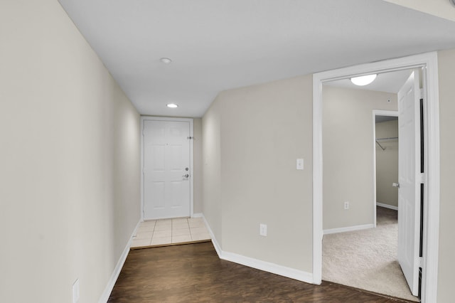 15185 Michelangelo Blvd Unit 204, Delray Beach, FL 33446 - corridor featuring baseboards, wood finished floors, and recessed lighting