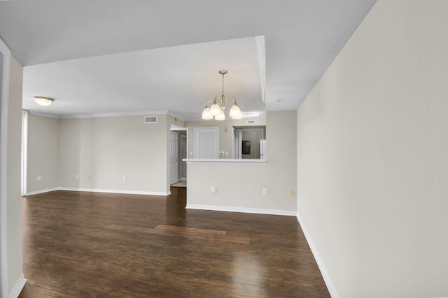 15185 Michelangelo Blvd Unit 204, Delray Beach, FL 33446 - unfurnished living room featuring a chandelier, dark wood-type flooring, and baseboards
