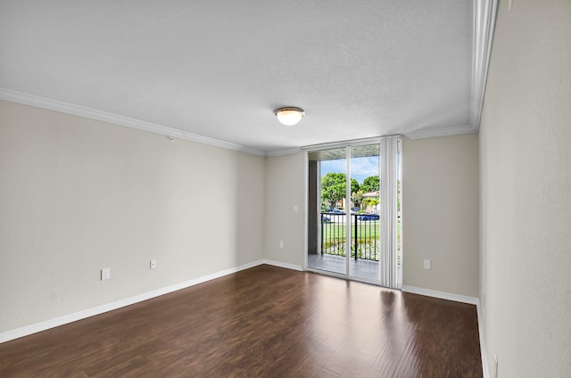 15185 Michelangelo Blvd Unit 204, Delray Beach, FL 33446 - spare room featuring dark wood-type flooring, ornamental molding, baseboards, a textured ceiling, and floor to ceiling windows