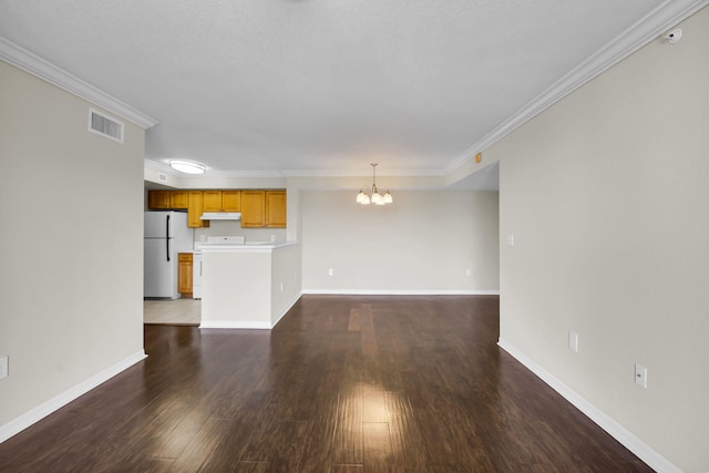 15185 Michelangelo Blvd Unit 204, Delray Beach, FL 33446 - unfurnished living room featuring a chandelier, ornamental molding, wood finished floors, and baseboards