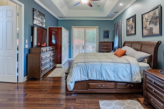 473 SW Dagget Ave, Port Saint Lucie, FL 34953 - bedroom featuring a raised ceiling, dark wood-type flooring, access to outside, ornamental molding, and ceiling fan
