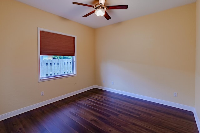 473 SW Dagget Ave, Port Saint Lucie, FL 34953 - unfurnished room with a ceiling fan, dark wood-style floors, and baseboards