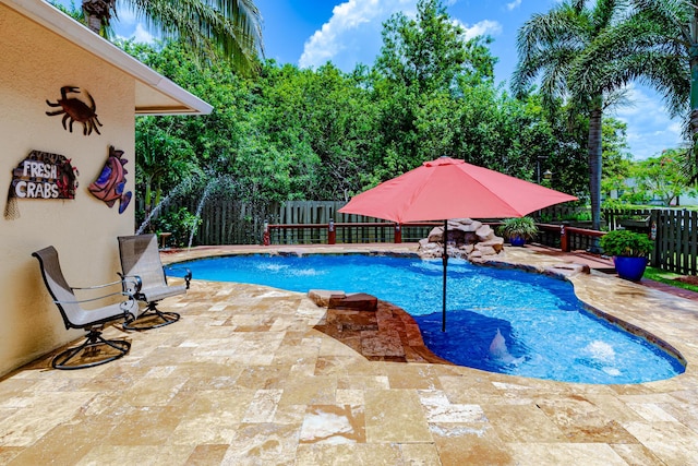 473 SW Dagget Ave, Port Saint Lucie, FL 34953 - view of pool featuring a fenced backyard and a patio area