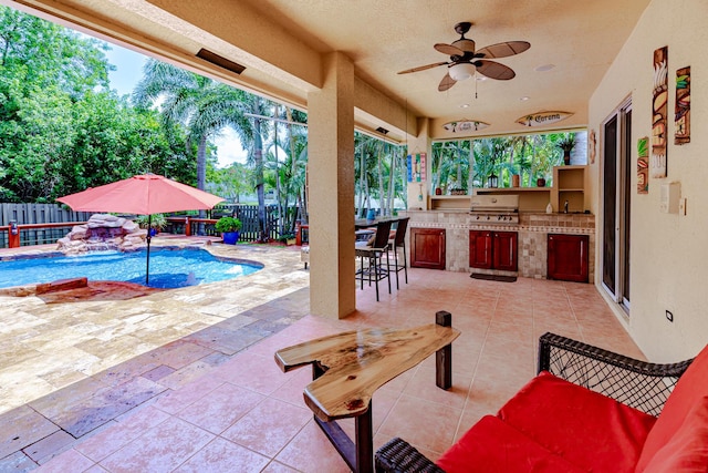 473 SW Dagget Ave, Port Saint Lucie, FL 34953 - fenced backyard featuring a bar, a patio area, and a ceiling fan
