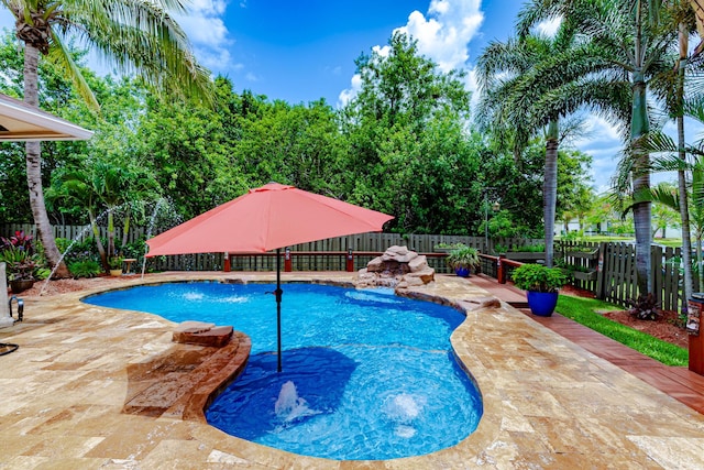 473 SW Dagget Ave, Port Saint Lucie, FL 34953 - view of pool featuring a fenced backyard and a patio