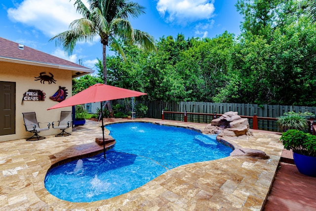 473 SW Dagget Ave, Port Saint Lucie, FL 34953 - view of swimming pool with a patio area