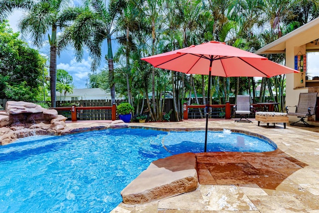 473 SW Dagget Ave, Port Saint Lucie, FL 34953 - view of swimming pool featuring a patio area