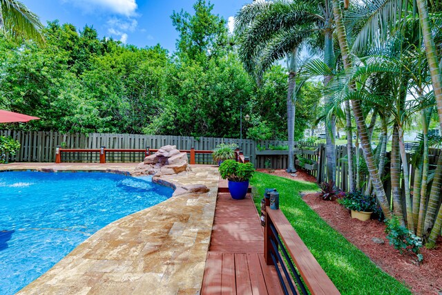 473 SW Dagget Ave, Port Saint Lucie, FL 34953 - view of pool featuring a fenced backyard