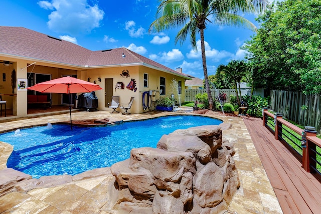 473 SW Dagget Ave, Port Saint Lucie, FL 34953 - view of swimming pool featuring a fenced backyard and a patio