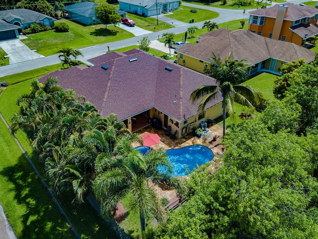 473 SW Dagget Ave, Port Saint Lucie, FL 34953 - aerial view of residential area with a pool