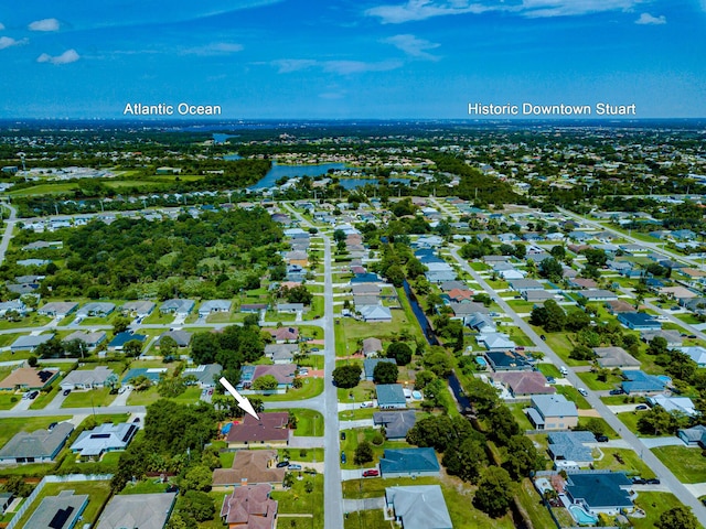 473 SW Dagget Ave, Port Saint Lucie, FL 34953 - aerial perspective of suburban area with a nearby body of water