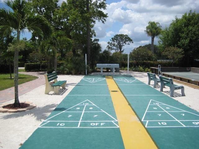 18081 SE Country Club Dr Unit 4-31, Jupiter, FL 33469 - view of home's community featuring shuffleboard