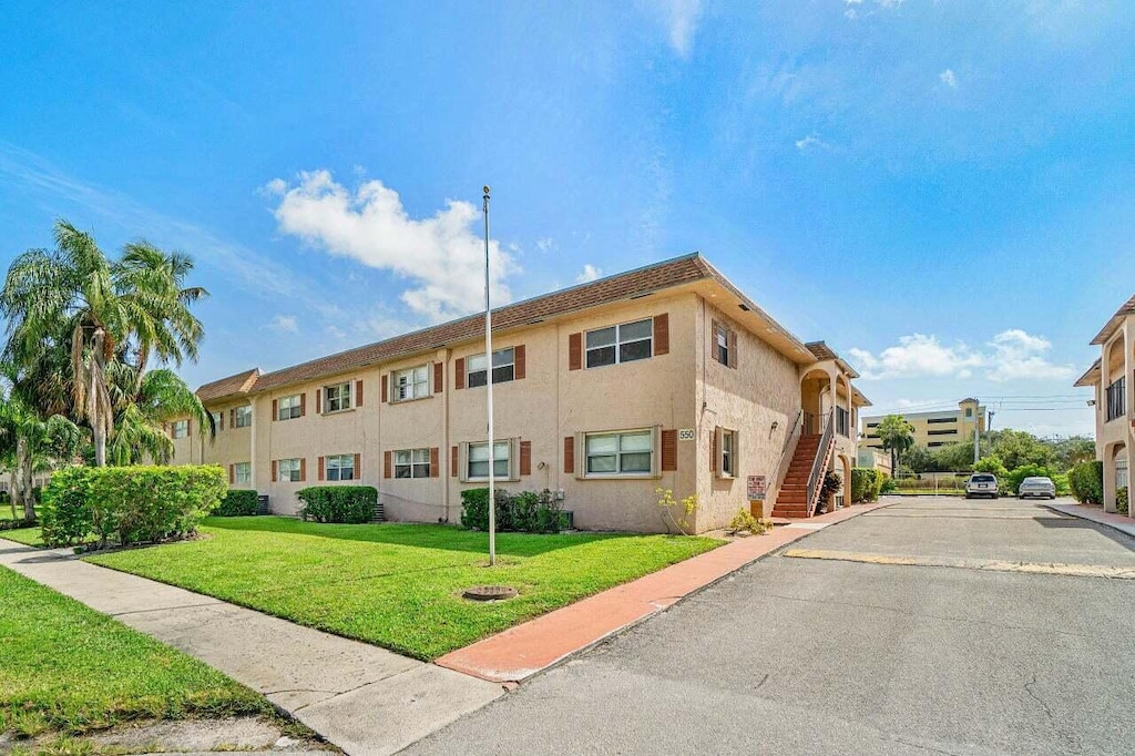 500 SW 2nd Ave Unit 120, Boca Raton, FL 33432 - view of building exterior featuring stairway