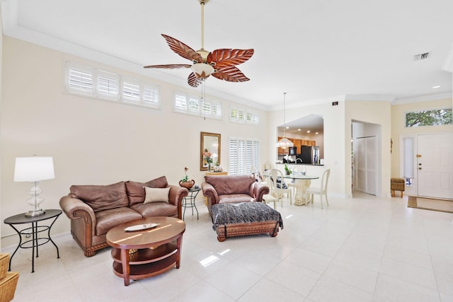 1071 Delray Lakes Dr, Delray Beach, FL 33444 - living area with ornamental molding, ceiling fan, light tile patterned flooring, baseboards, and recessed lighting